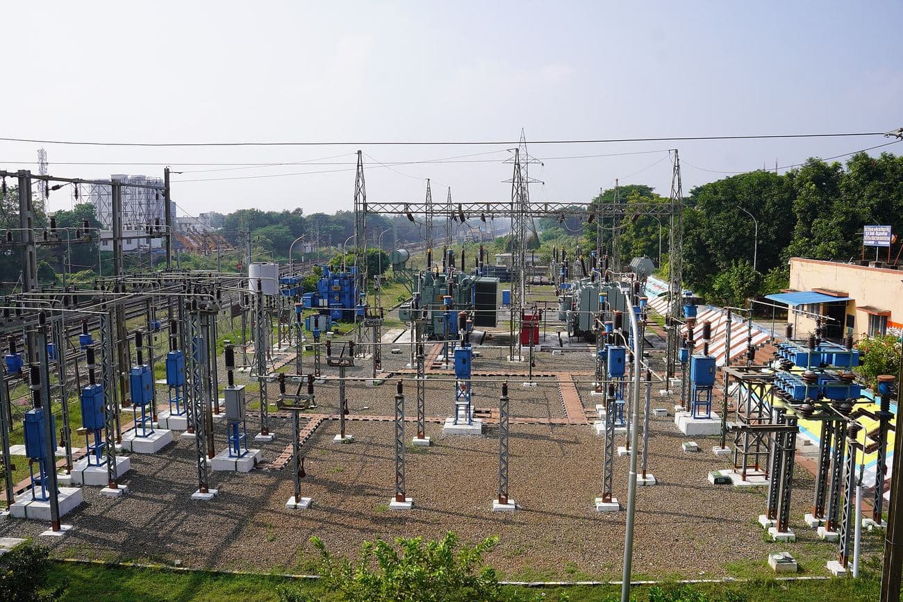 An electrical substation of switchgear and transmission gantries